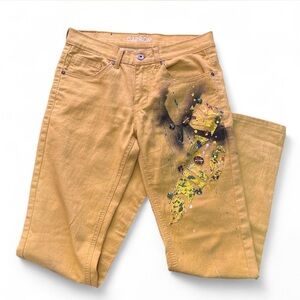 Rhinestone embellished yellow jeans